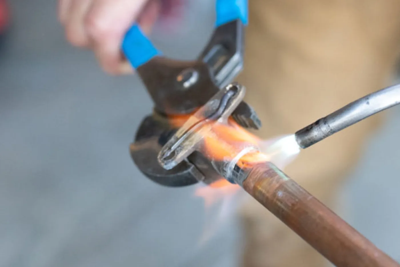 Reid Pro gasfitter soldering a copper pipe joint